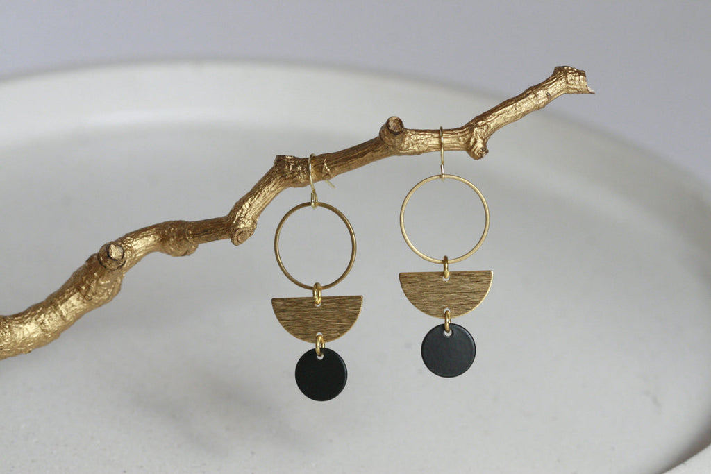 These geometric beauties make a big statement, yet are still so easy to wear. Brass charm with gold plated earring hoop.